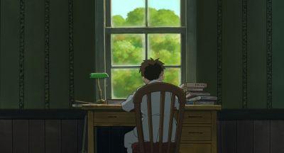 眞人が本を読んでいる